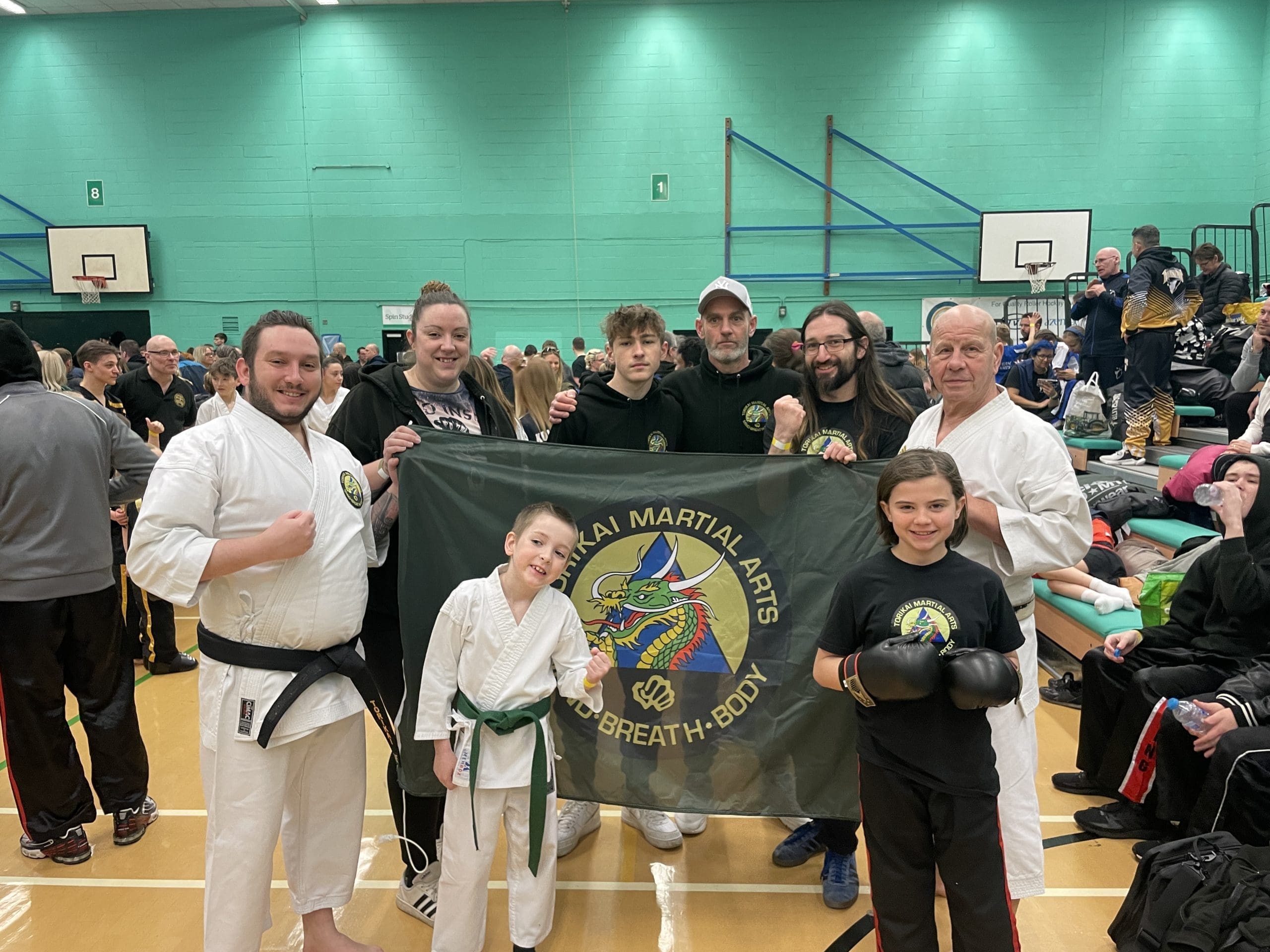A group photo of the ToriKai competition squad. Two competitors are students in the Werrington Children Karate class.
